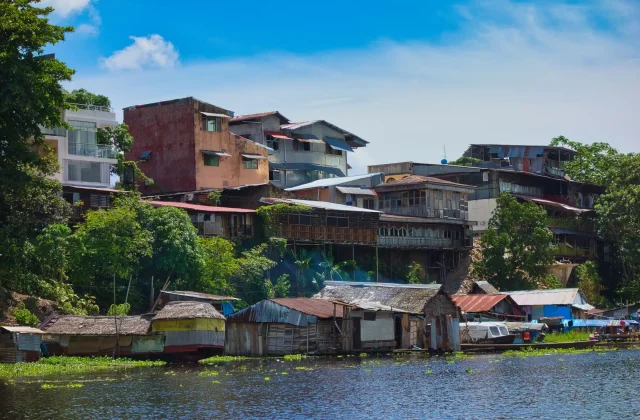 scenic-view-river-passing-through-bustling-cityscape-iquitos-peru-amazon